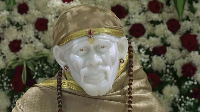 Up down shot video of Sai Ram or Sai Baba idol at temple