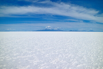 Fototapeta na wymiar Stunning View of Salar de Uyuni, the Largest Salt Flat in the World and a Famous UNESCO World Heritage Site in Bolivia, South America