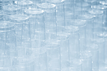 The pile of plastic cups in the light blue scene.