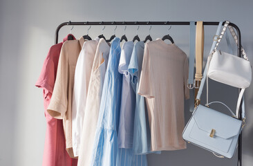 light colored womens summer clothes on  hanger