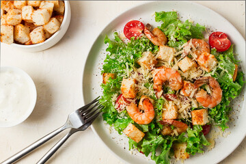 caesar salad, with shrimp, on a white background, homemade, no people,