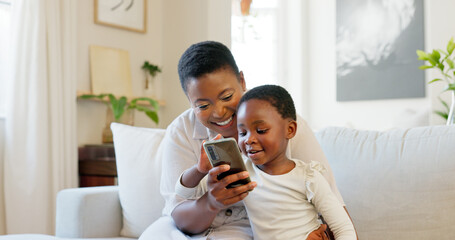 Surprise, phone and black family bonding on sofa in house or home living room with fun education,...