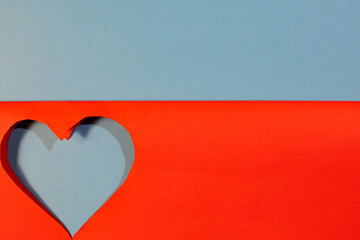 Heart symbol cut out of red paper, paper valentine, paper craft