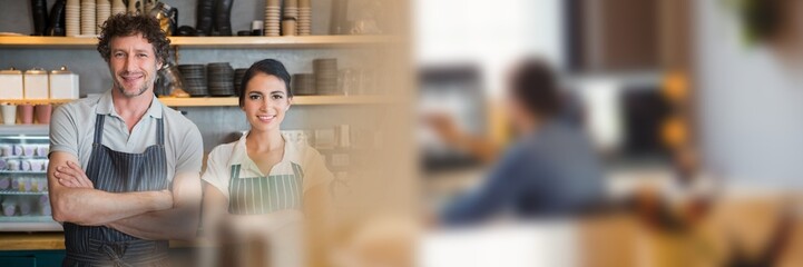 Blurred effect with copy space against portrait of caucasian couple s miling at a cafe