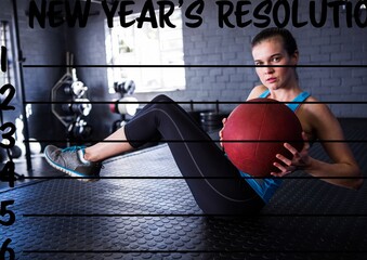 New year resolution template against caucasian fit woman working out with medicine ball at the gym