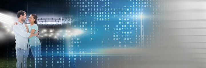 Blurred effect with copy space against caucasian couple hugging each other and binary coding