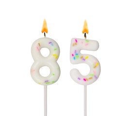 White birthday candles isolated on white background. Number 85.