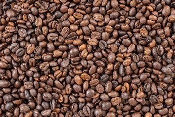 Fresh roasted brown coffee beans background