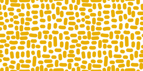 Seamless pattern with yellow polka dots on white background. © smth.design