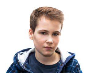 Head and shoulders portrait of a young 11 year old boy with brown eyes and dark hair in a good mood with a smile looks into the camera isolated on transparent background
