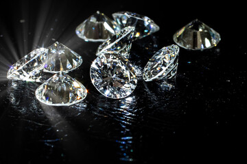 set of diamonds on the black leather table