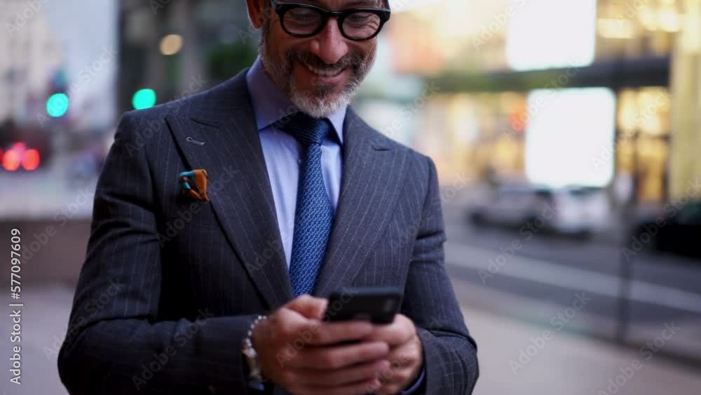 Poster smiling 50 years old successful man typing text message on mobile phone screen while using app.prosp
