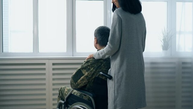 Wife supporting her soldier husband with disability going through rough times