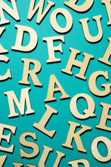 Wooden letters on a green table