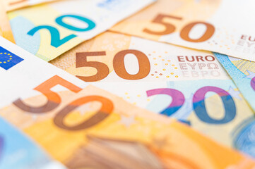 Banknotes of 20 and 50 euros arranged disorderly. Value for money.
