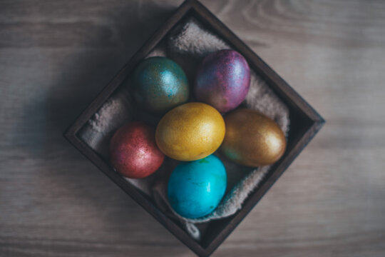 colored Easter eggs still life on the table