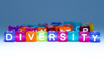 Macro photo of the word "diversity" on a colorful cube. fun concept about respecting differences. inscription on the cubes. education sign series for education and learning