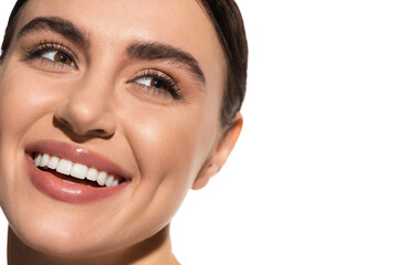close up of satisfied young woman with flawless makeup smiling isolated on white.