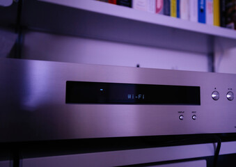 Wi-fi text on the network audio player on living room shelves