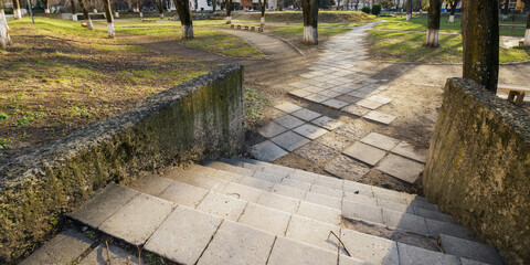 walkway with steps in the park. vacation and leisure background