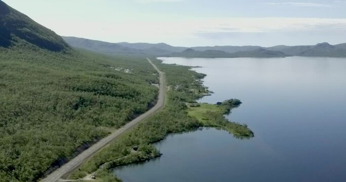 Aerial view at Kilpisj&auml;rvi, Lapland ,Finland and European route E8 that goes from Tromso, Norway to Turku, Finland in summer.