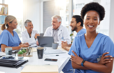 Portrait, happy black woman or nurses in meeting for a strategy or working in hospital for healthcare together. African, smile or group of doctors talking, planning or helping innovation or ideas