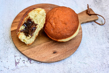 Delicious home made Donuts with Chocolate Filling covered with  icing sugar