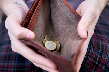 man hand putting money, closeup