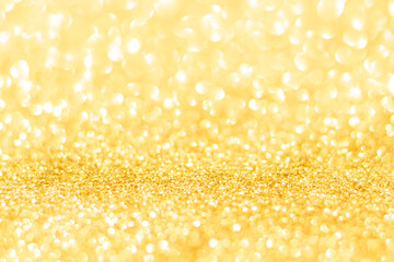 Gold glitter defocused texture background. gold christmas abstract background.