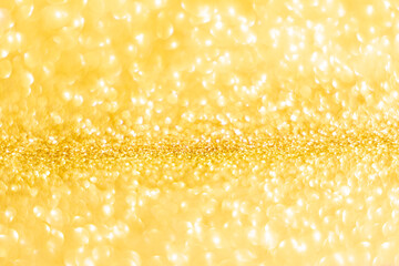 Gold glitter defocused texture background. gold christmas abstract background.