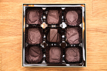 Last piece of chocolate from a luxury chocolate gift box.