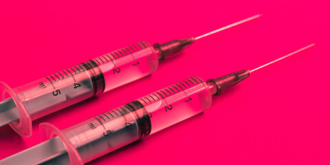 Disposable plastic syringe prepared for injection and vaccination in the hospital. The concept of...