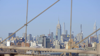 Fototapeta na wymiar Skyline of Midtown Manhattan view from Brooklyn Bridge - travel photography