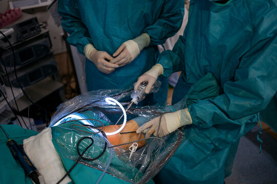 Team of surgeons operating in the hospital. Healthcare concept