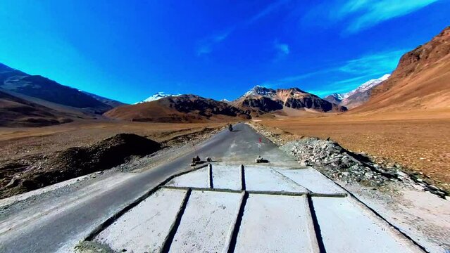 Bike passing by National Highway 
Capture the magnitude of this breath-taking journey with high-quality stock video footage