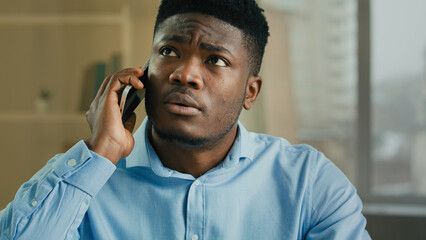 Businessman happy african american male executive manager office worker answer incoming mobile call...