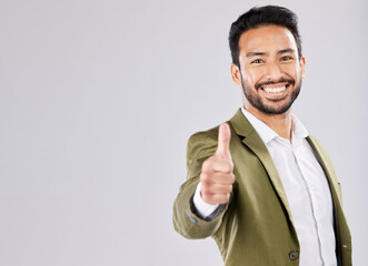 Thumbs up, business and portrait of man with smile on white background for success, leadership and goals. Entrepreneur, mockup space and happy male with thank you, promotion and agreement hand sign