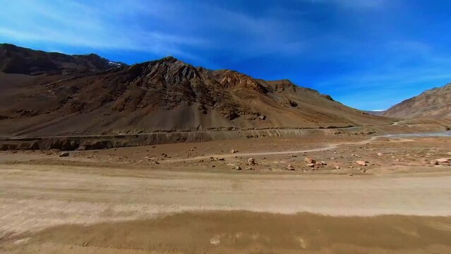 A Journey Through the Rocky Mountains: POV Driving Through a Dusty Road
Take a journey along a bumpy and dusty mountain road with this immersive POV footage. The camera is mounted on a vehicle and cap