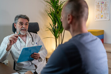 Doctor talking with patient