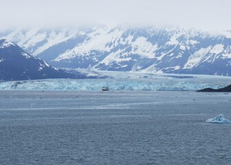 Hubbard glacier with a cruise ship in the foreground. 