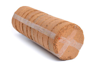 Coconut Coir substrate. Pressed briquette Isolated on White Background