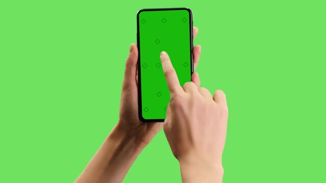 Template for cell phone with green screen and green background. The hand points and then swipes.