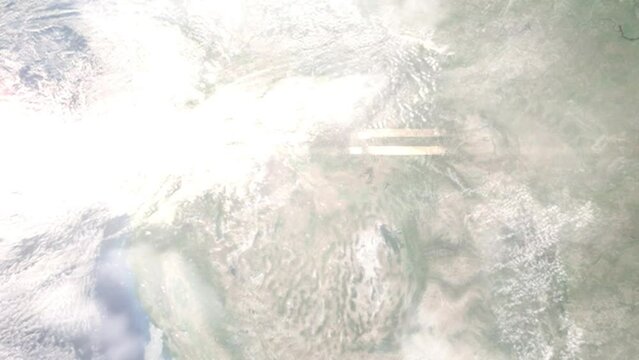 Earth zoom in from outer space to city. Zooming on Mountain Home, Idaho, USA. The animation continues by zoom out through clouds and atmosphere into space. Images from NASA