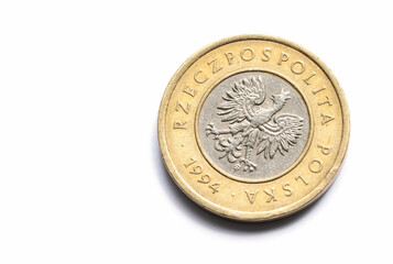 Polish currency, one single coin, two zloty reverse side, eagle, object macro detail, extreme closeup, nobody, no people, 2 zl coin on white background, slight shadow, 1994, Polish economy and banking