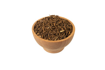 Valerian herb root in wooden bowl isolated on white background.Valeriana officinalis. used in...