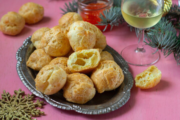 French fluffy savoury cheese puffs gougeres for cocktails - 577129279