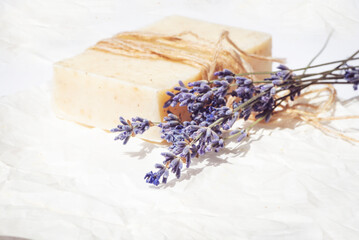 Obraz na płótnie Canvas Natural handmade soap with lavender flowers