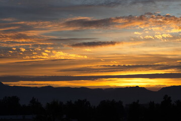 Spectacular and colorful sunrise on the horizon in Murcia