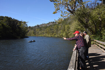 Anglers Fish White River and Visitors Watch