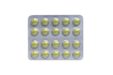 Small blister pills isolated on white background.